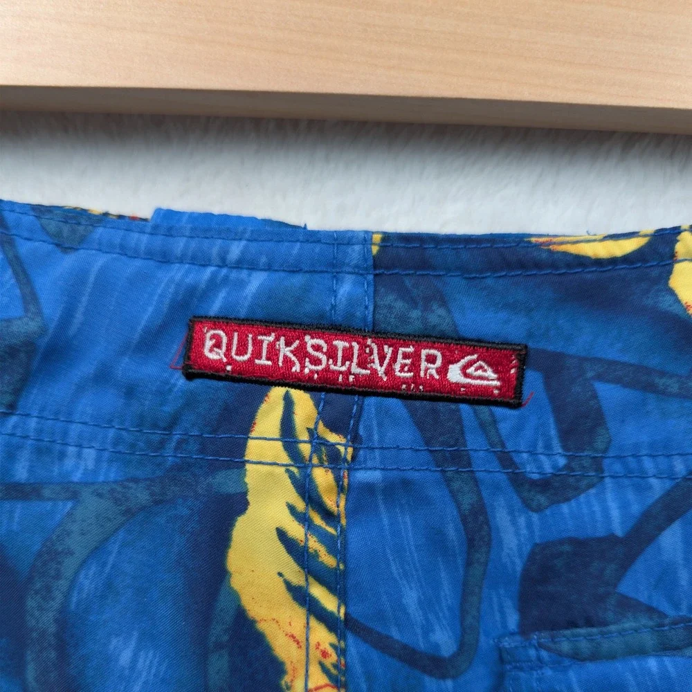 VTG Quiksilver Board Shorts Mens 35 Blue Yellow Floral Hibiscus Surf Relaxed Y2K